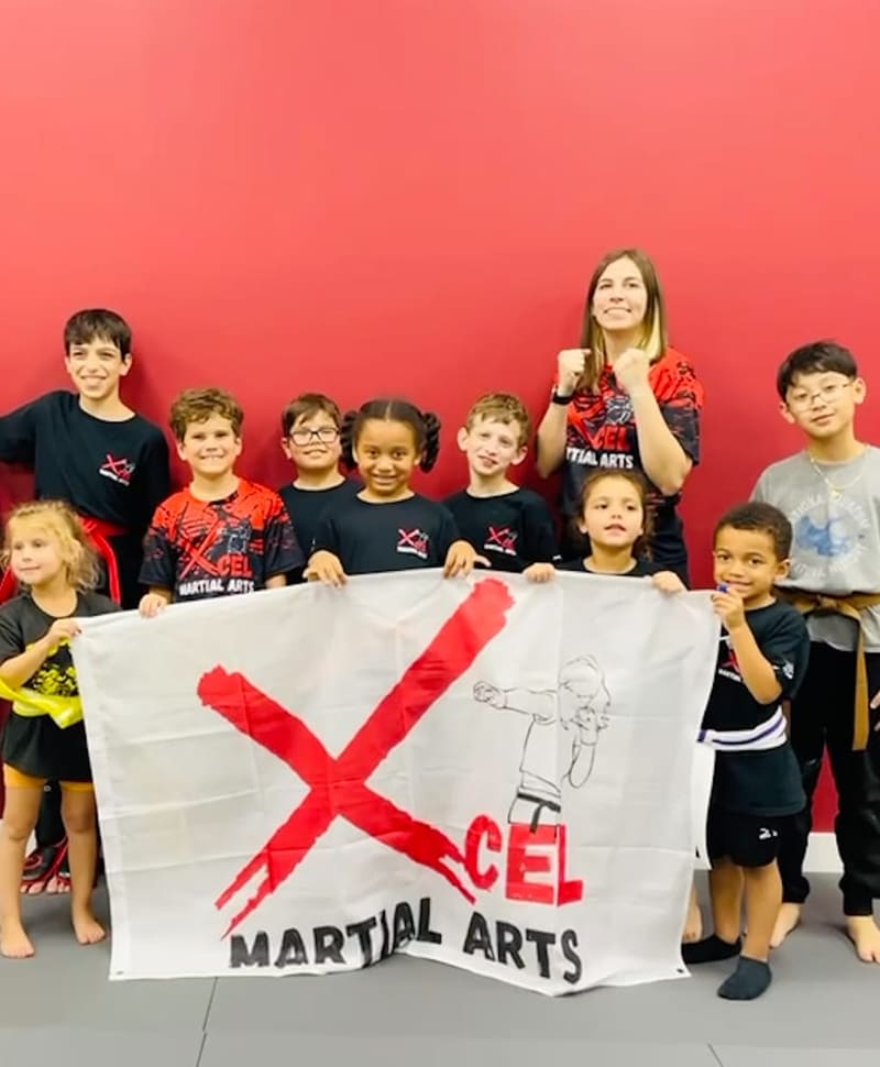 Full class group photo at Xcel Martial Arts academy in Boca Raton FL