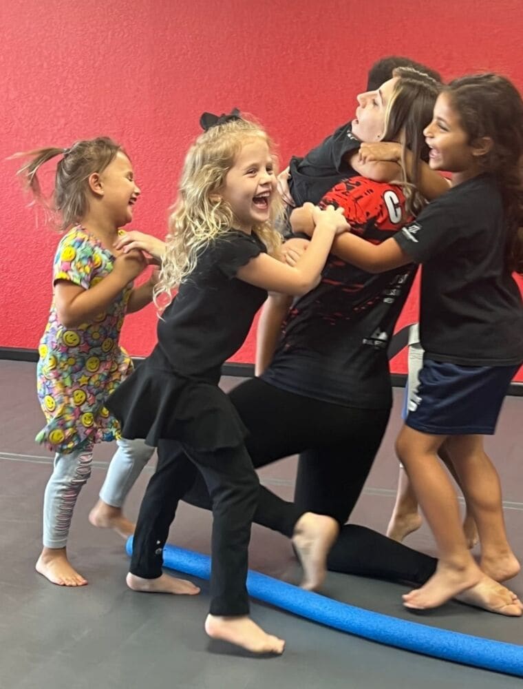 Kids having fun during martial arts class in Boca Raton Florida